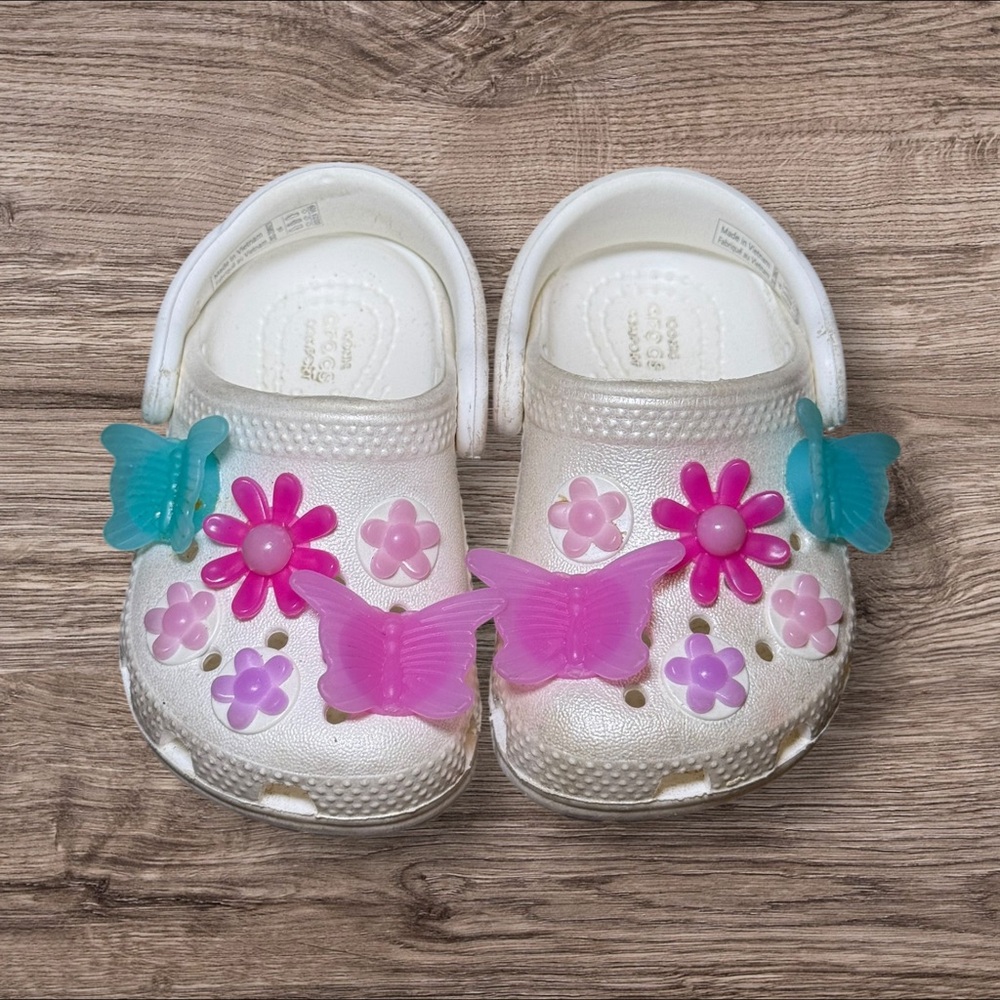 Kids' White and Pink Crocs with Butterfly Accents